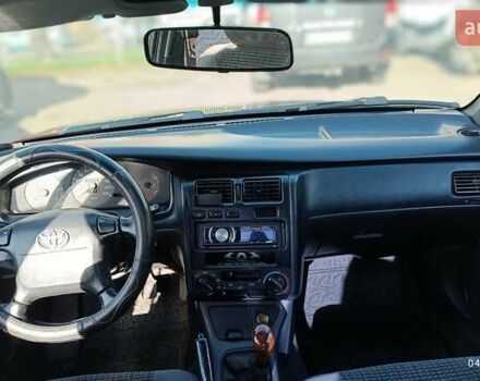 Червоний Тойота Carina E, об'ємом двигуна 2 л та пробігом 260 тис. км за 4500 $, фото 6 на Automoto.ua