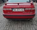 Червоний Тойота Carina E, об'ємом двигуна 1.6 л та пробігом 300 тис. км за 2670 $, фото 1 на Automoto.ua