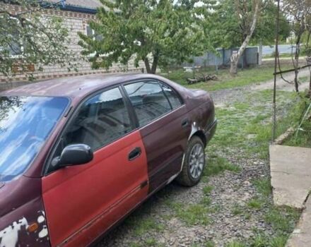 Красный Тойота Carina E, объемом двигателя 1.6 л и пробегом 450 тыс. км за 1150 $, фото 10 на Automoto.ua