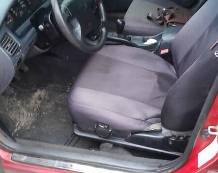 Червоний Тойота Carina E, об'ємом двигуна 1.6 л та пробігом 300 тис. км за 2670 $, фото 9 на Automoto.ua