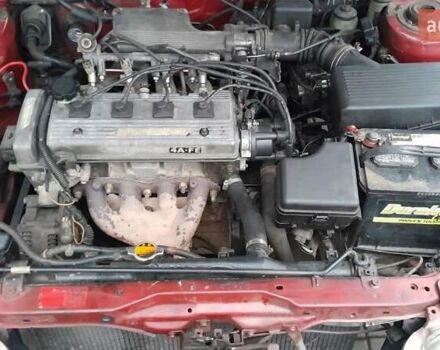 Червоний Тойота Carina E, об'ємом двигуна 1.6 л та пробігом 300 тис. км за 2670 $, фото 11 на Automoto.ua