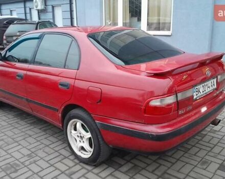 Червоний Тойота Carina E, об'ємом двигуна 1.6 л та пробігом 300 тис. км за 2670 $, фото 13 на Automoto.ua