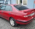 Червоний Тойота Carina E, об'ємом двигуна 1.6 л та пробігом 300 тис. км за 2670 $, фото 13 на Automoto.ua