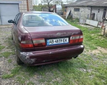 Красный Тойота Carina E, объемом двигателя 1.6 л и пробегом 450 тыс. км за 1150 $, фото 6 на Automoto.ua