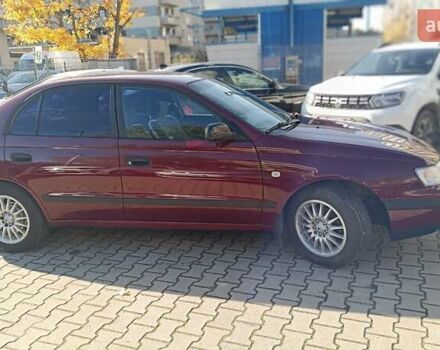 Червоний Тойота Carina E, об'ємом двигуна 2 л та пробігом 260 тис. км за 4500 $, фото 1 на Automoto.ua