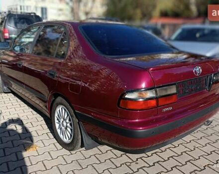 Червоний Тойота Carina E, об'ємом двигуна 2 л та пробігом 260 тис. км за 4500 $, фото 9 на Automoto.ua