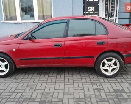 Червоний Тойота Carina E, об'ємом двигуна 1.6 л та пробігом 300 тис. км за 2670 $, фото 4 на Automoto.ua