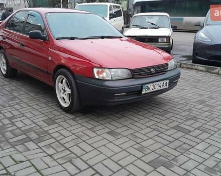 Червоний Тойота Carina E, об'ємом двигуна 1.6 л та пробігом 300 тис. км за 2670 $, фото 3 на Automoto.ua