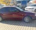 Красный Тойота Carina E, объемом двигателя 2 л и пробегом 260 тыс. км за 4200 $, фото 1 на Automoto.ua