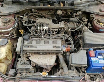 Червоний Тойота Carina E, об'ємом двигуна 1.6 л та пробігом 220 тис. км за 1500 $, фото 10 на Automoto.ua