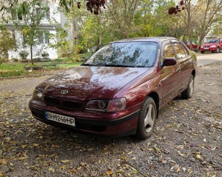 Червоний Тойота Carina E, об'ємом двигуна 1.6 л та пробігом 220 тис. км за 1500 $, фото 4 на Automoto.ua