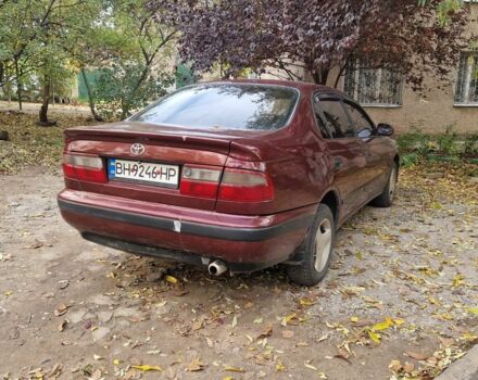 Червоний Тойота Carina E, об'ємом двигуна 1.6 л та пробігом 220 тис. км за 1500 $, фото 2 на Automoto.ua