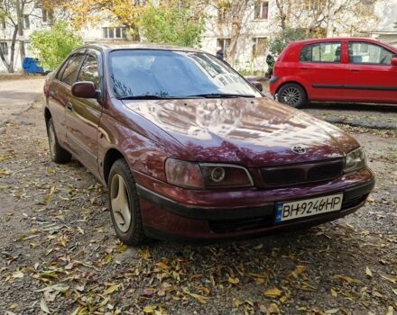 Червоний Тойота Carina E, об'ємом двигуна 1.6 л та пробігом 220 тис. км за 1500 $, фото 5 на Automoto.ua