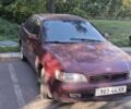 Червоний Тойота Carina E, об'ємом двигуна 0 л та пробігом 218 тис. км за 2100 $, фото 6 на Automoto.ua