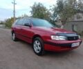 Червоний Тойота Carina E, об'ємом двигуна 1.6 л та пробігом 111 тис. км за 2000 $, фото 1 на Automoto.ua