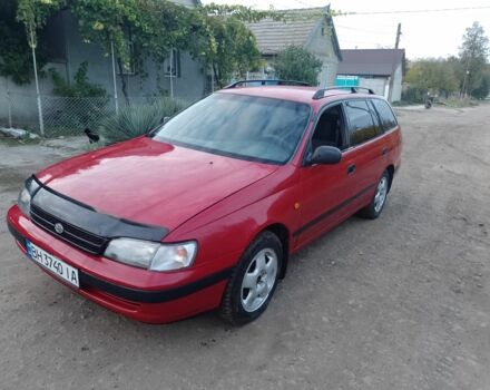 Червоний Тойота Carina E, об'ємом двигуна 1.6 л та пробігом 111 тис. км за 2000 $, фото 1 на Automoto.ua