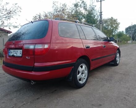 Червоний Тойота Carina E, об'ємом двигуна 1.6 л та пробігом 111 тис. км за 2000 $, фото 4 на Automoto.ua