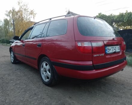 Червоний Тойота Carina E, об'ємом двигуна 1.6 л та пробігом 111 тис. км за 2000 $, фото 3 на Automoto.ua