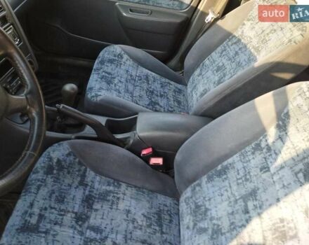 Красный Тойота Carina E, объемом двигателя 2 л и пробегом 450 тыс. км за 3700 $, фото 12 на Automoto.ua