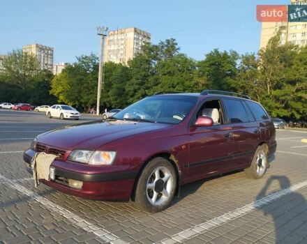 Красный Тойота Carina E, объемом двигателя 2 л и пробегом 450 тыс. км за 3700 $, фото 5 на Automoto.ua