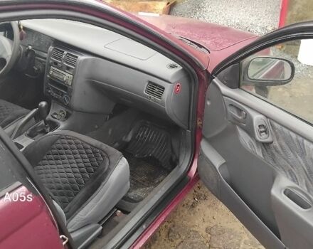 Червоний Тойота Carina E, об'ємом двигуна 1.8 л та пробігом 500 тис. км за 1600 $, фото 1 на Automoto.ua