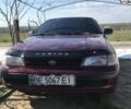 Червоний Тойота Carina E, об'ємом двигуна 1.8 л та пробігом 386 тис. км за 3000 $, фото 1 на Automoto.ua