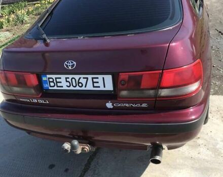 Червоний Тойота Carina E, об'ємом двигуна 1.8 л та пробігом 386 тис. км за 3000 $, фото 1 на Automoto.ua