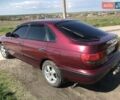 Червоний Тойота Carina E, об'ємом двигуна 1.8 л та пробігом 386 тис. км за 3000 $, фото 5 на Automoto.ua