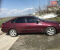 Червоний Тойота Carina E, об'ємом двигуна 1.8 л та пробігом 386 тис. км за 3000 $, фото 2 на Automoto.ua