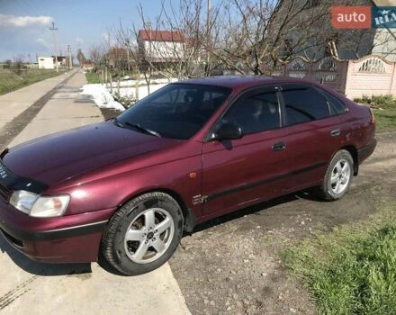Червоний Тойота Carina E, об'ємом двигуна 1.8 л та пробігом 386 тис. км за 3000 $, фото 4 на Automoto.ua