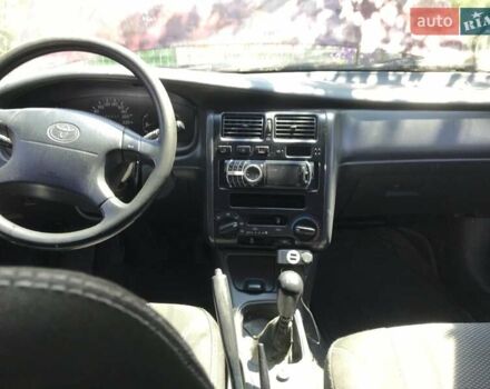 Червоний Тойота Carina E, об'ємом двигуна 1.8 л та пробігом 386 тис. км за 3000 $, фото 8 на Automoto.ua