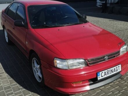Красный Тойота Carina E, объемом двигателя 2 л и пробегом 400 тыс. км за 3600 $, фото 1 на Automoto.ua