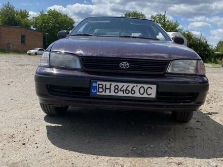 Червоний Тойота Carina E, об'ємом двигуна 1.59 л та пробігом 497 тис. км за 2600 $, фото 1 на Automoto.ua