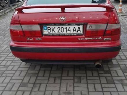 Червоний Тойота Carina E, об'ємом двигуна 1.6 л та пробігом 300 тис. км за 2670 $, фото 1 на Automoto.ua