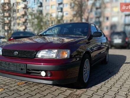 Червоний Тойота Carina E, об'ємом двигуна 2 л та пробігом 260 тис. км за 4500 $, фото 1 на Automoto.ua