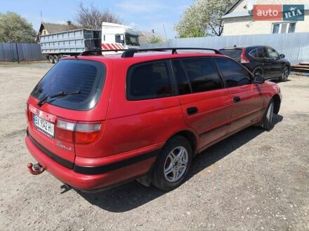 Тойота Carina E 1997 в Изяслве на Automoto.ua Красный Тойота Carina E, объемом двигателя 1.8 л и пробегом 340 тыс. км за 2750 $, фото 1 на Automoto.ua