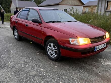 Червоний Тойота Carina E, об'ємом двигуна 1.6 л та пробігом 3 тис. км за 2400 $, фото 1 на Automoto.ua
