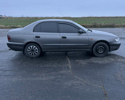 Сірий Тойота Carina E, об'ємом двигуна 2 л та пробігом 450 тис. км за 3000 $, фото 7 на Automoto.ua