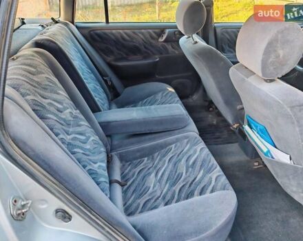 Сірий Тойота Carina E, об'ємом двигуна 1.8 л та пробігом 256 тис. км за 2850 $, фото 12 на Automoto.ua