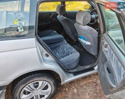 Сірий Тойота Carina E, об'ємом двигуна 1.8 л та пробігом 256 тис. км за 2850 $, фото 10 на Automoto.ua