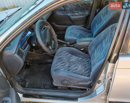 Сірий Тойота Carina E, об'ємом двигуна 1.8 л та пробігом 256 тис. км за 2850 $, фото 4 на Automoto.ua