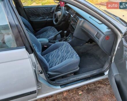 Сірий Тойота Carina E, об'ємом двигуна 1.8 л та пробігом 256 тис. км за 2850 $, фото 2 на Automoto.ua