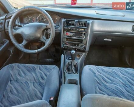 Сірий Тойота Carina E, об'ємом двигуна 1.8 л та пробігом 256 тис. км за 2850 $, фото 11 на Automoto.ua