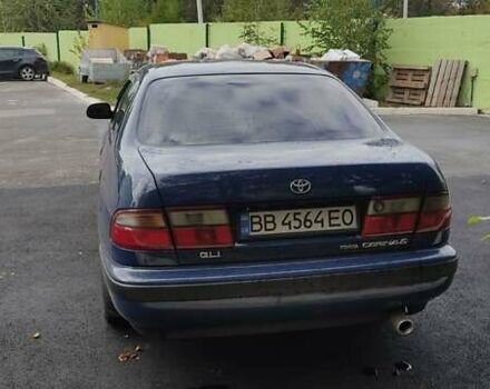 Синій Тойота Carina E, об'ємом двигуна 2 л та пробігом 397 тис. км за 4750 $, фото 5 на Automoto.ua