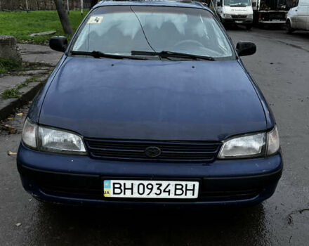 Синій Тойота Carina E, об'ємом двигуна 2 л та пробігом 188 тис. км за 1750 $, фото 2 на Automoto.ua