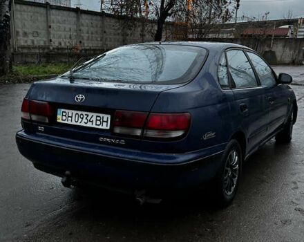 Синій Тойота Carina E, об'ємом двигуна 2 л та пробігом 188 тис. км за 1750 $, фото 4 на Automoto.ua