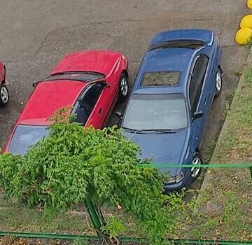 Синій Тойота Carina E, об'ємом двигуна 2 л та пробігом 397 тис. км за 4750 $, фото 10 на Automoto.ua