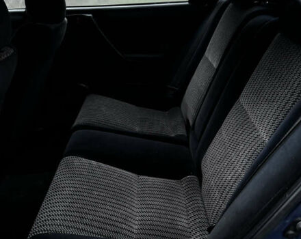 Синій Тойота Carina E, об'ємом двигуна 2 л та пробігом 188 тис. км за 1750 $, фото 9 на Automoto.ua