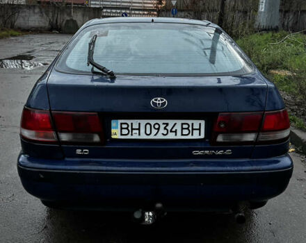 Синій Тойота Carina E, об'ємом двигуна 2 л та пробігом 188 тис. км за 1750 $, фото 6 на Automoto.ua