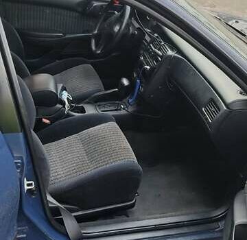Синій Тойота Carina E, об'ємом двигуна 2 л та пробігом 397 тис. км за 4750 $, фото 8 на Automoto.ua